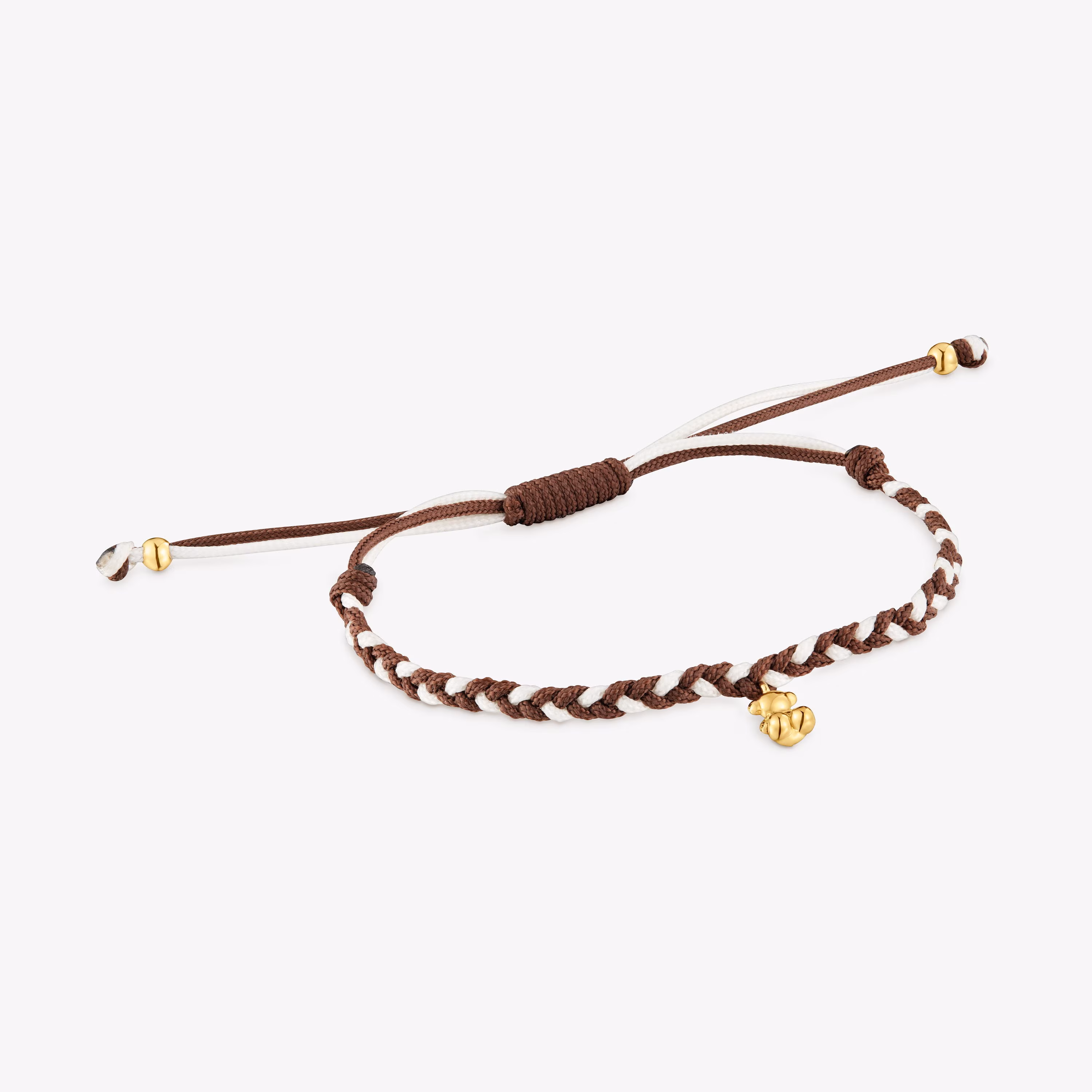 Pulsera oso con baño de oro 18 kt sobre plata y nylon marrón TOUS Motivos