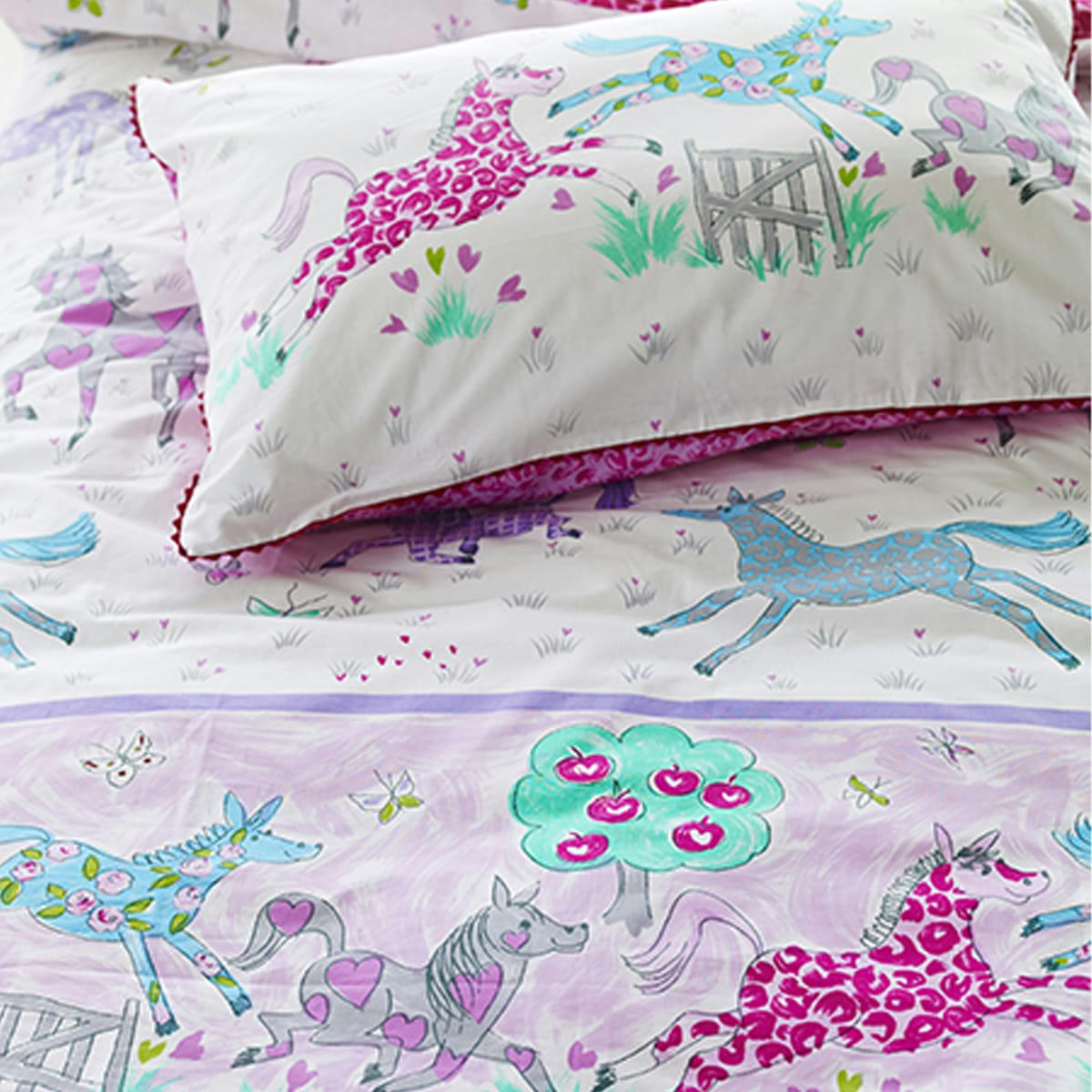 HORSING AROUND - Taie d'oreiller enfant en coton rose 50x70