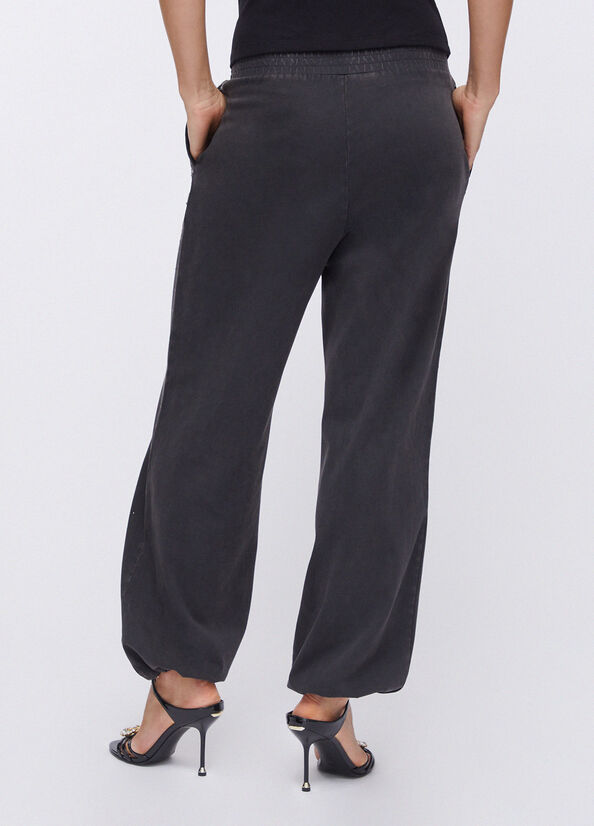 Pantalone in jersey d&eacute;lav&eacute; con strass