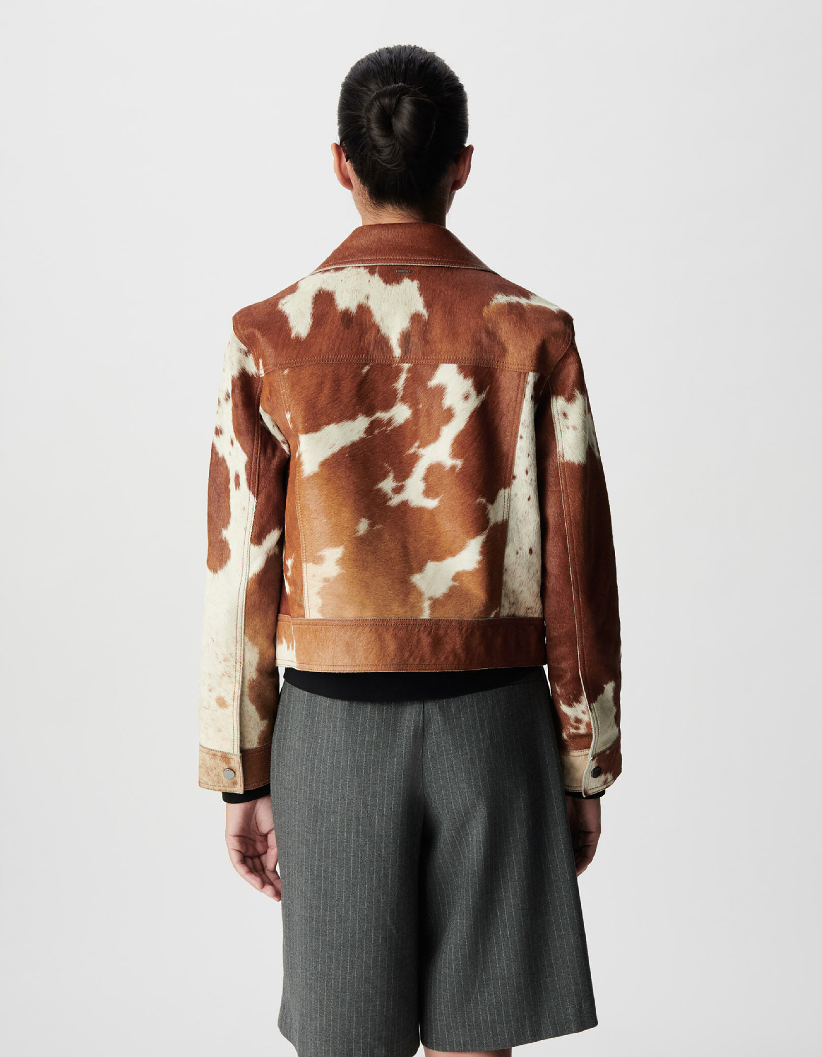 Veste courte en cuir marron motif vache Femme