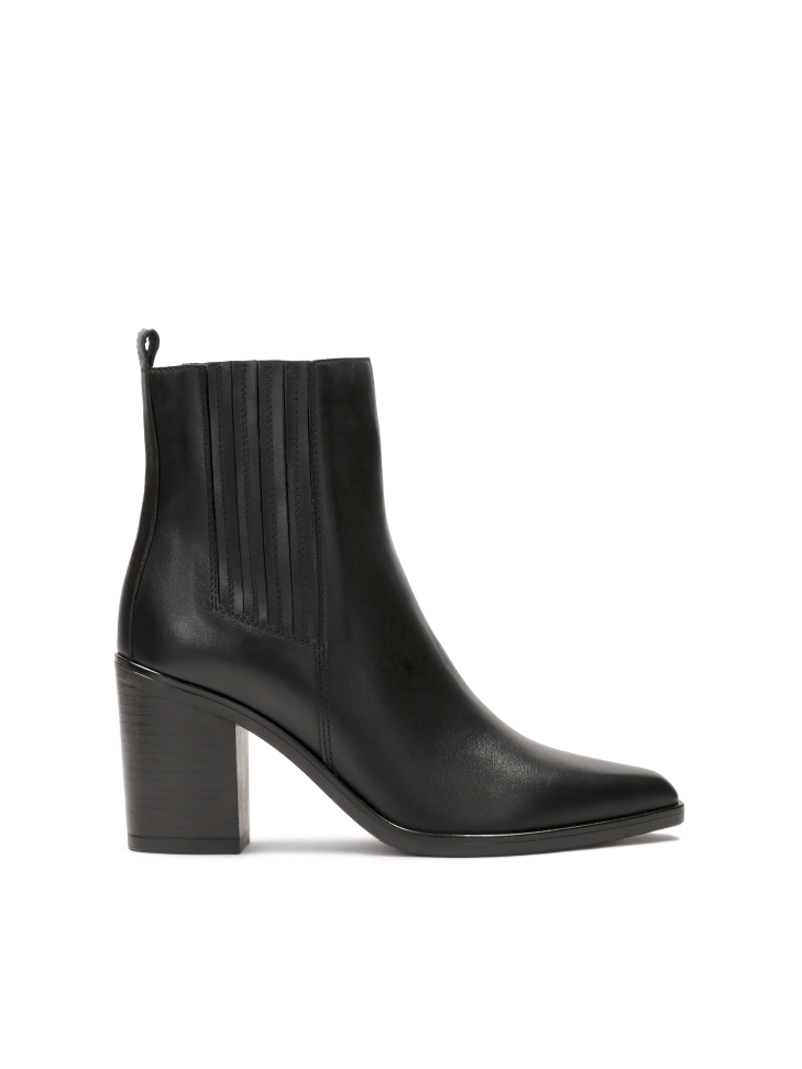 Classic black boots on a post with an extended nose