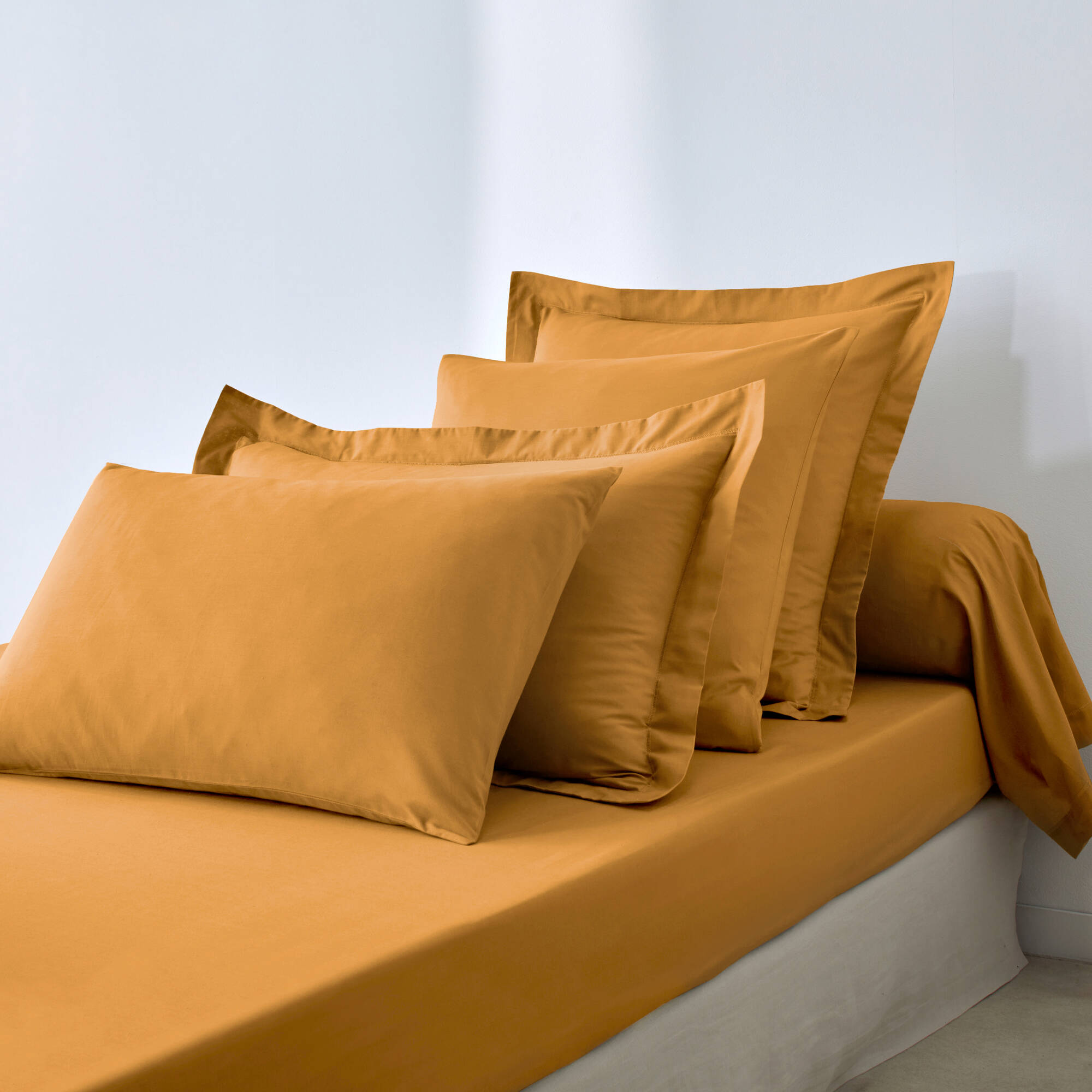 Drap-housse uni polyester - coton bonnet 32 cm