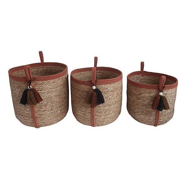 Panier rond en jonc de mer Norasia terracotta et couleur naturelle avec pompons taille S