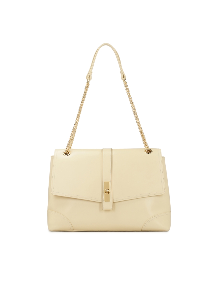 Cream shoulder bag with decorative clasp