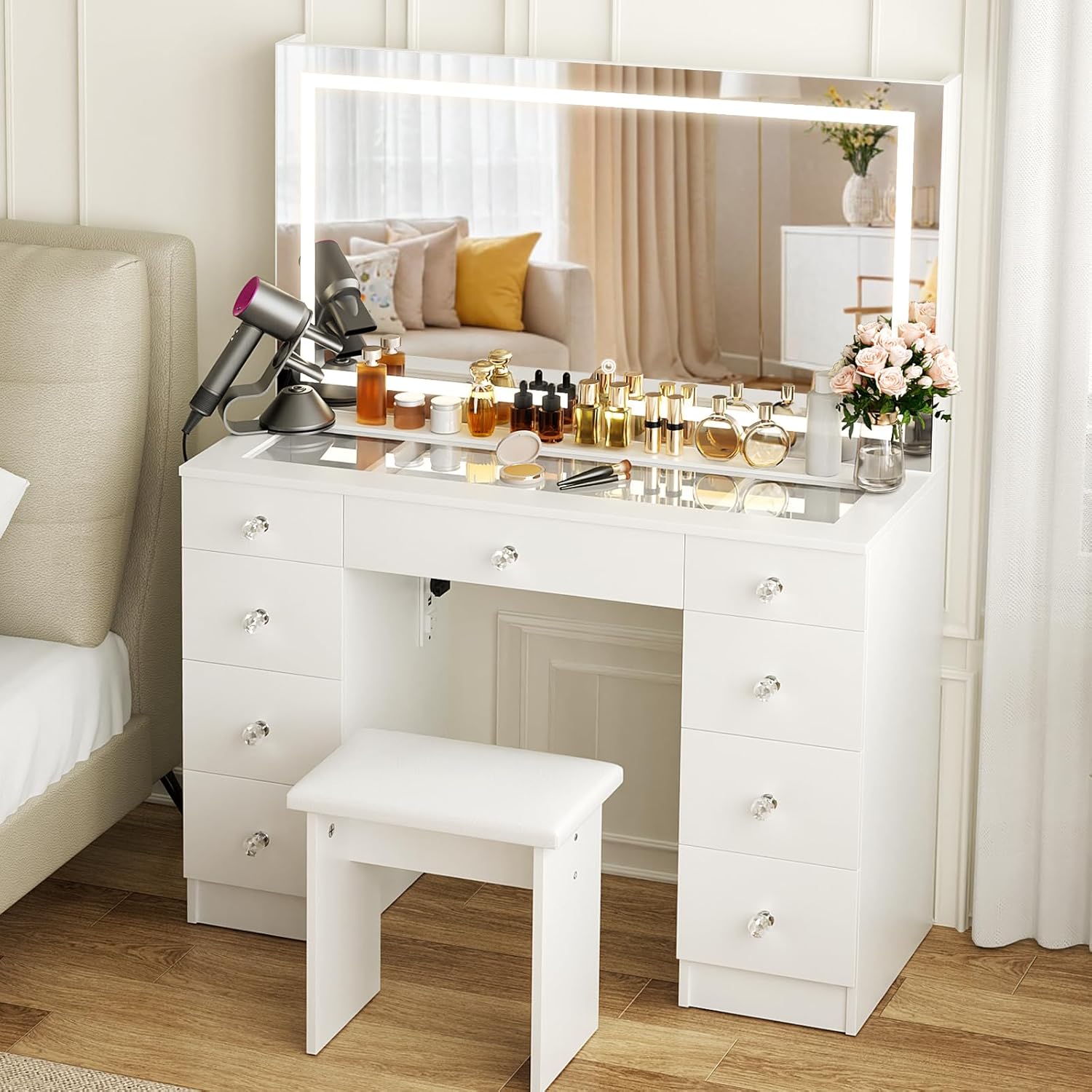 VOWNER Vanity with Lighted Mirror - Glass Top Makeup Desk with Power Outlet and 9 Drawers, 3 Color Lighting Modes Adjustable Brightness, 43 Vanity Desk with Soft Cushioned Stool for Bedroom, White
