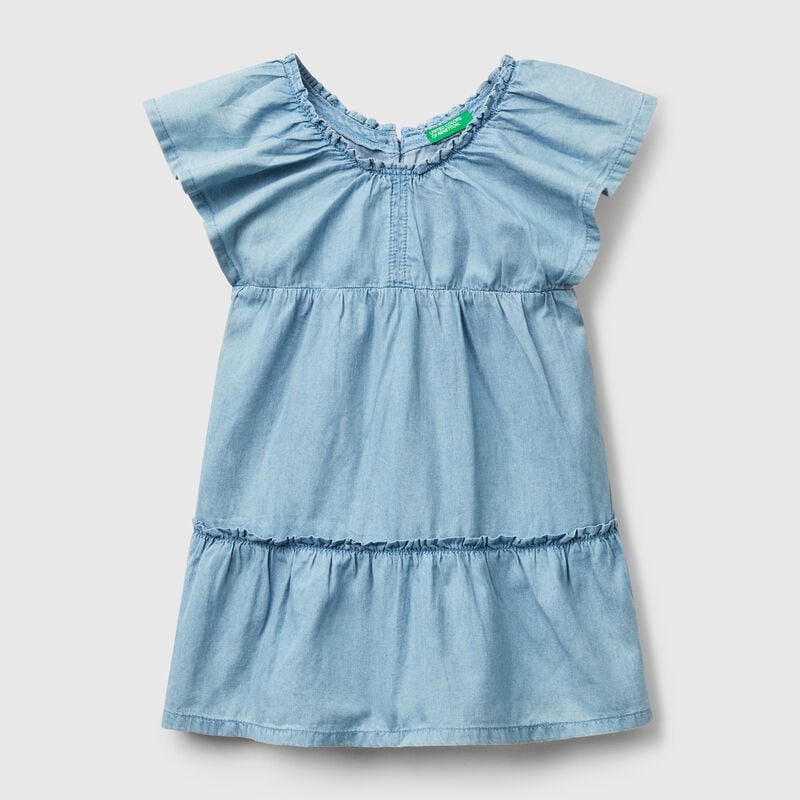 Dress in chambray with frill
