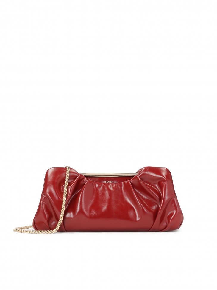 Maroon elegant handbag with a crease