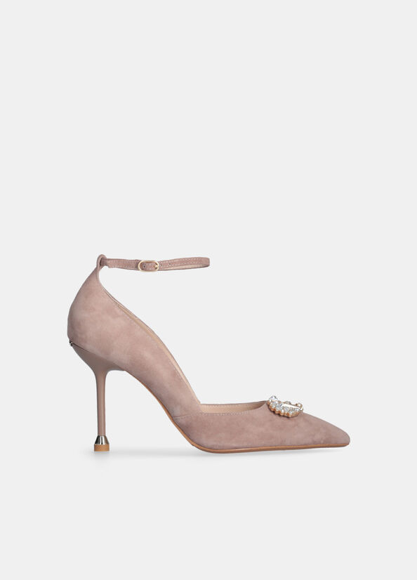 D&eacute;collet&eacute; con logo gioiello