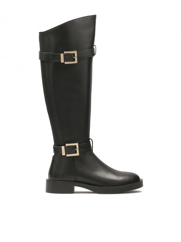 Classic black boots decorated with buckles on the upper