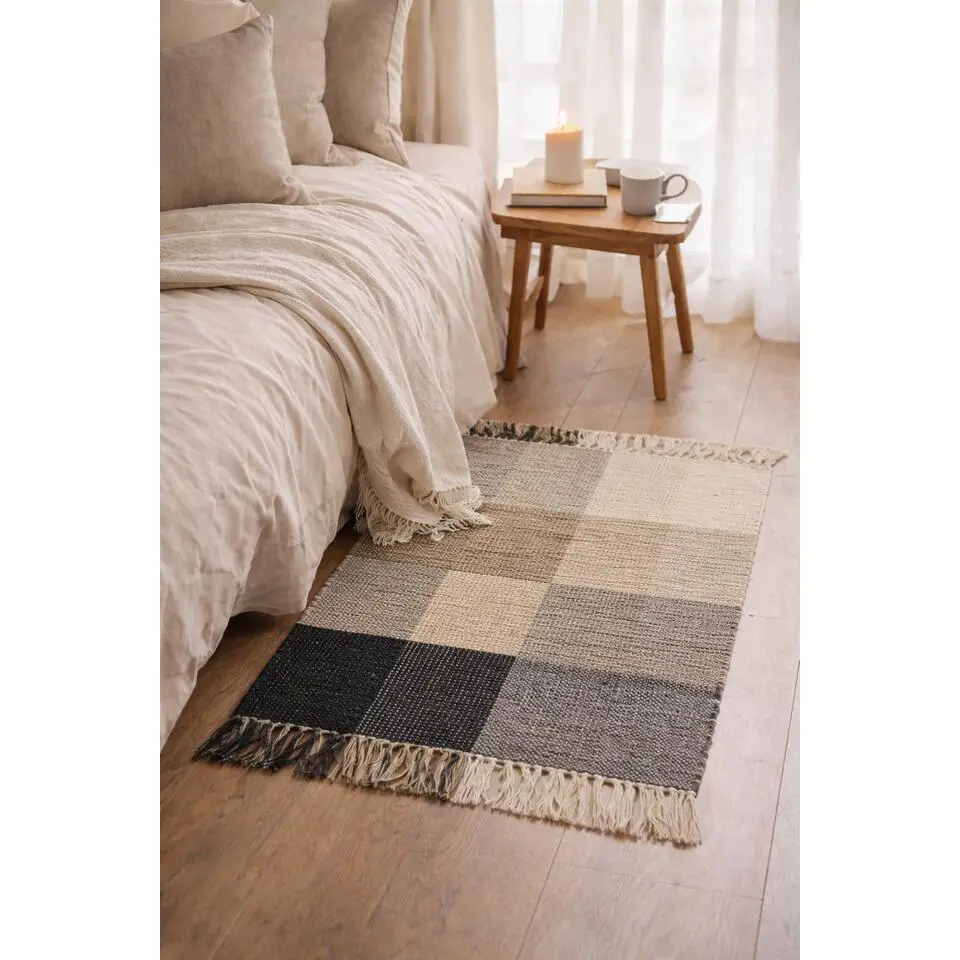 Rechthoekig katoenen tapijt met beige en zwarte motieven 90 x 60 cm