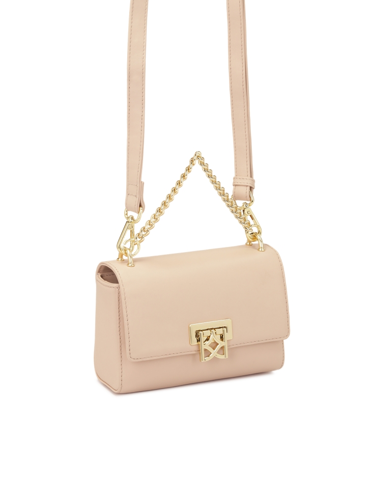 Sleek handbag with decorative clasp