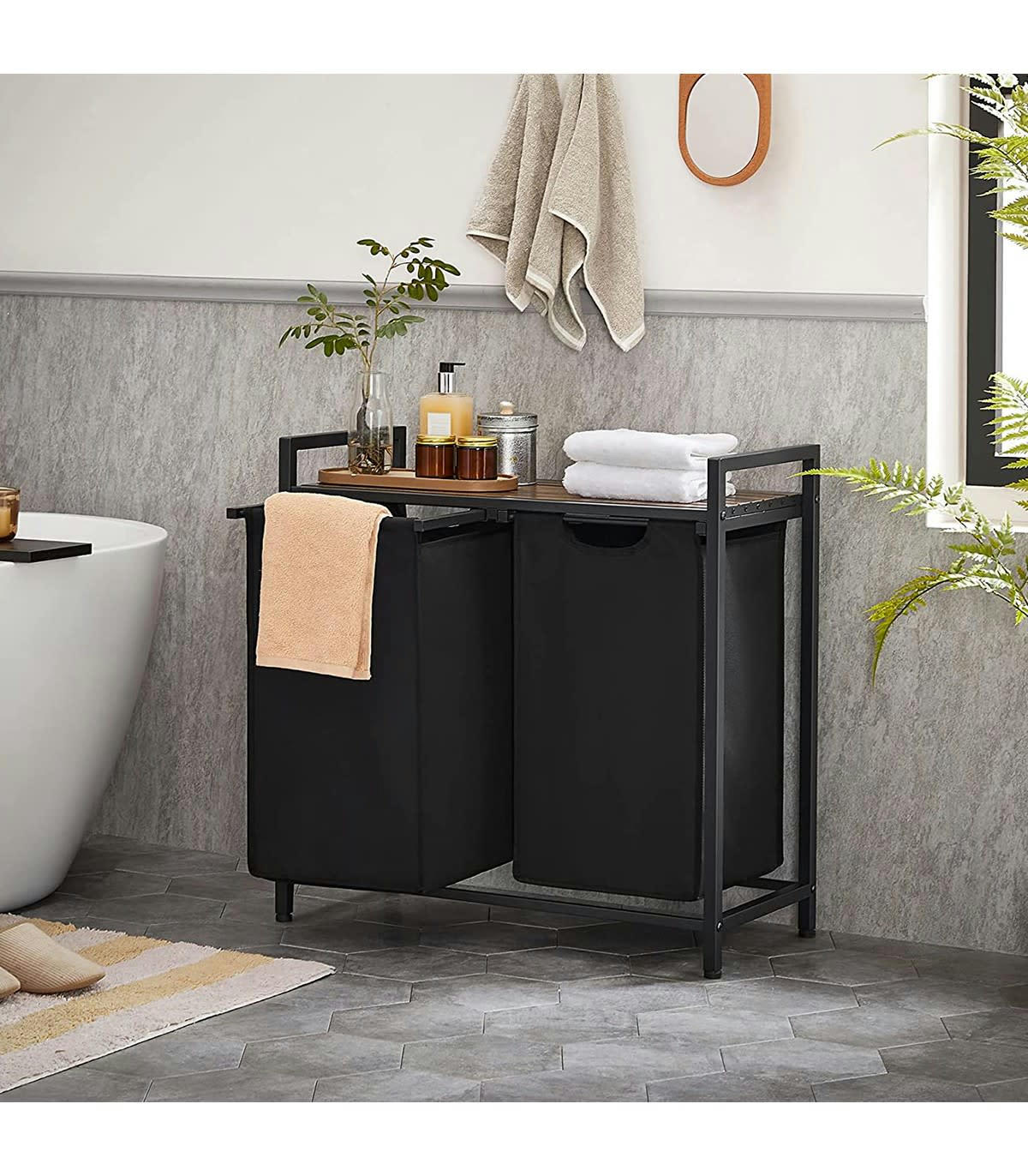 - Panier à linge 2 compartiments en tissu oxford noir et cadre métal