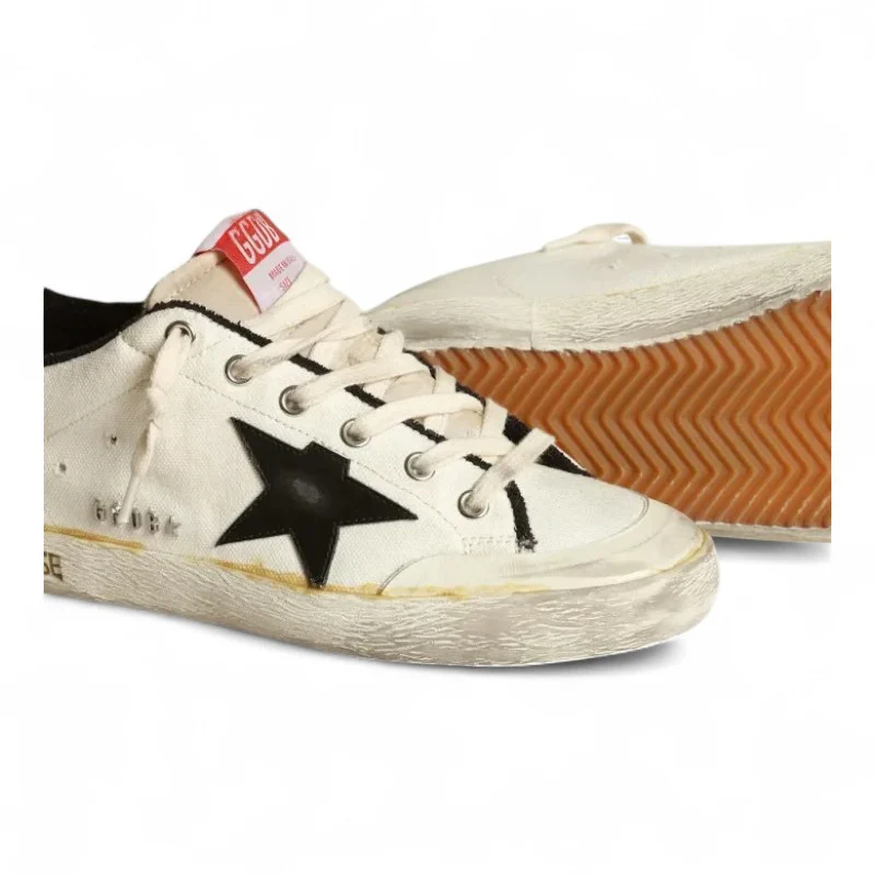 The Super-Star LTD sneakers in beige canvas with a black leather star and white leather heel tab