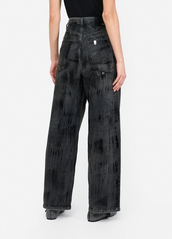 Jeans flare con spalmature
