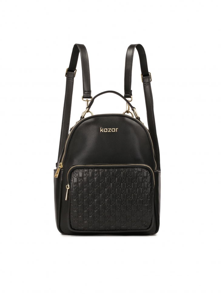 Black leather backpack decorated with embossed pattern