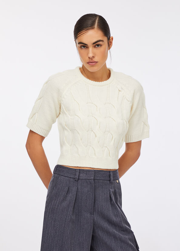 Maglia in lana a trecce