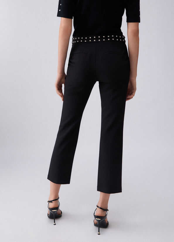 Pantaloni eleganti con borchie