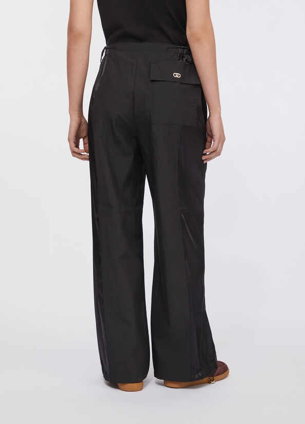 Pantaloni jogging in nylon e raso