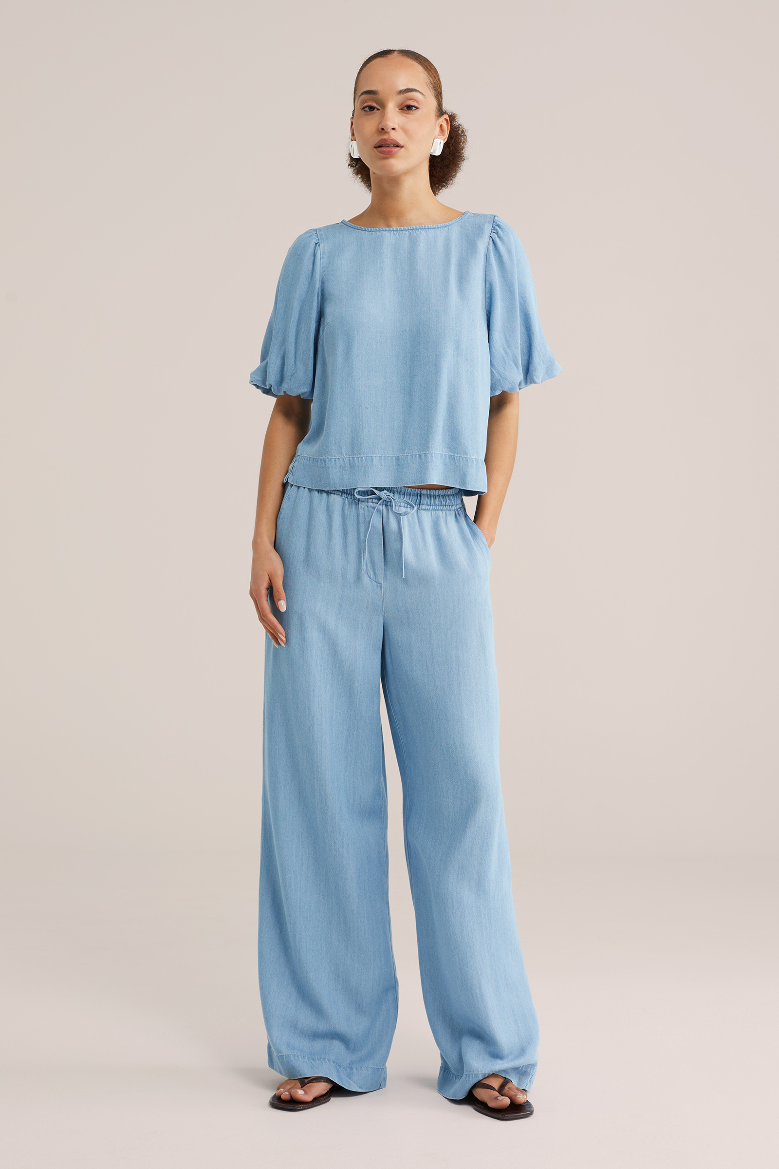 Dames denim blouse met ballonmouwen