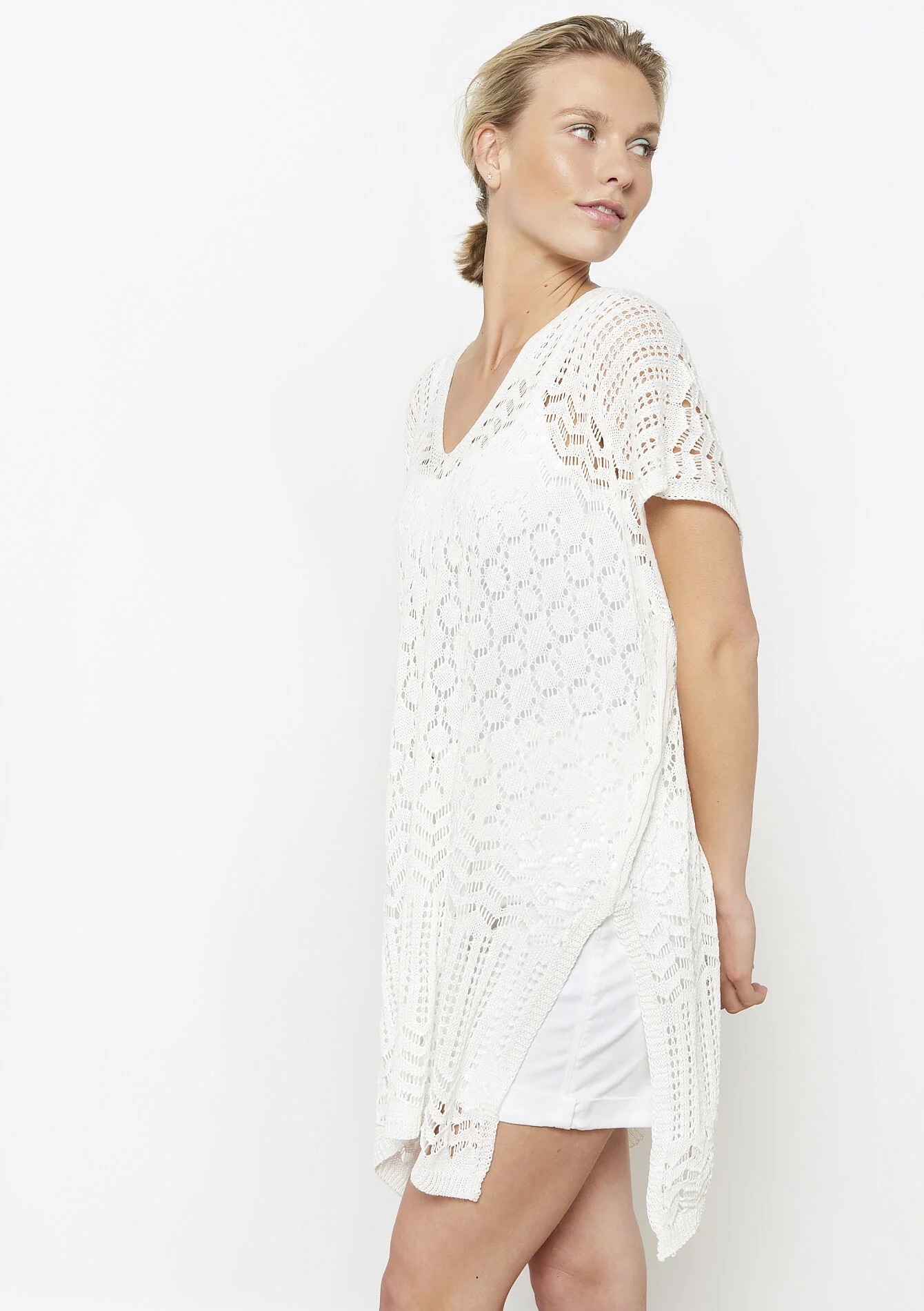 Opengewerkte tricot tuniek