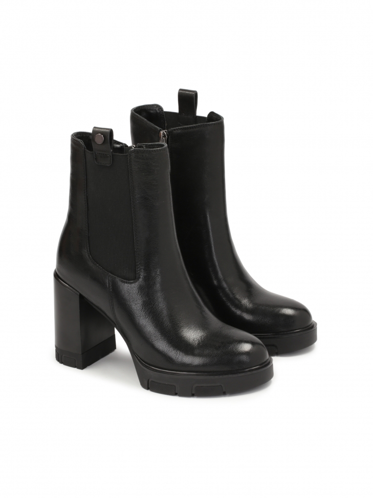 Black leather high booties with zip and elastic insert