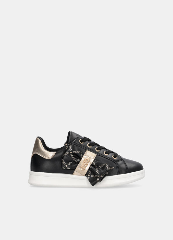 Sneakers con maxi fiocco