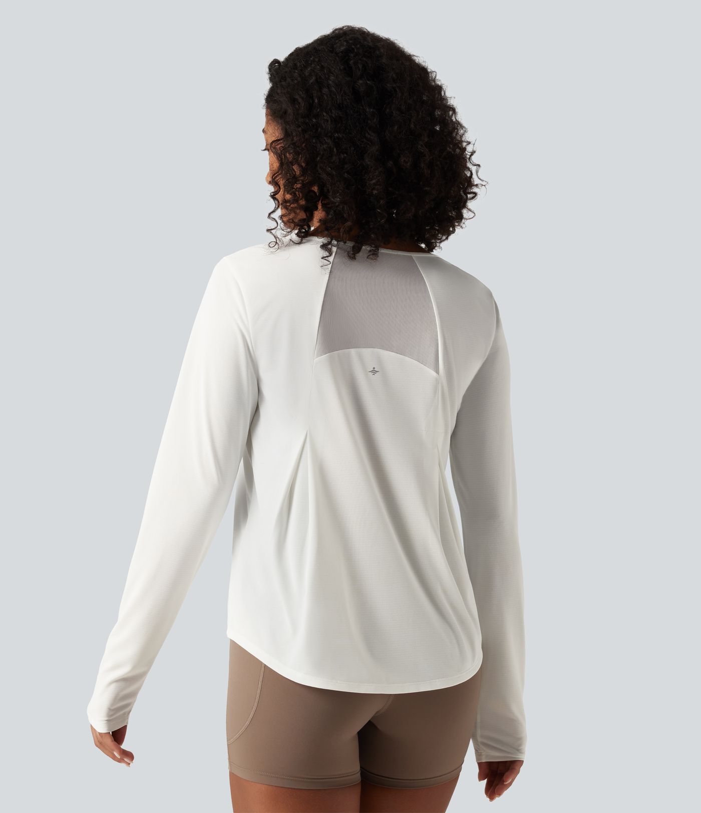 Haut de running à encolure arrondie, mesh contrasté et manches longues