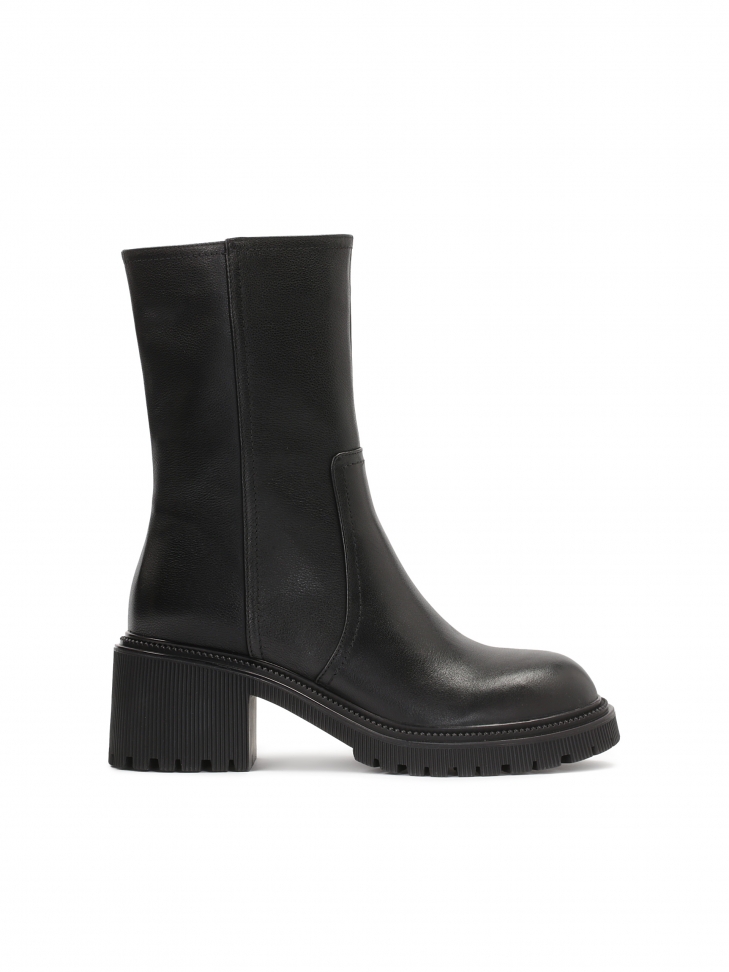 Leather booties with a tall upper and a wide heel with a protector
