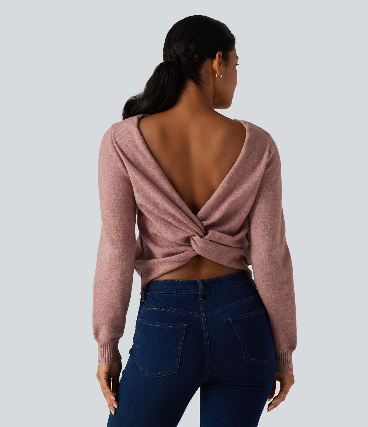 Pull à encolure arrondie, manches longues et détail torsadé