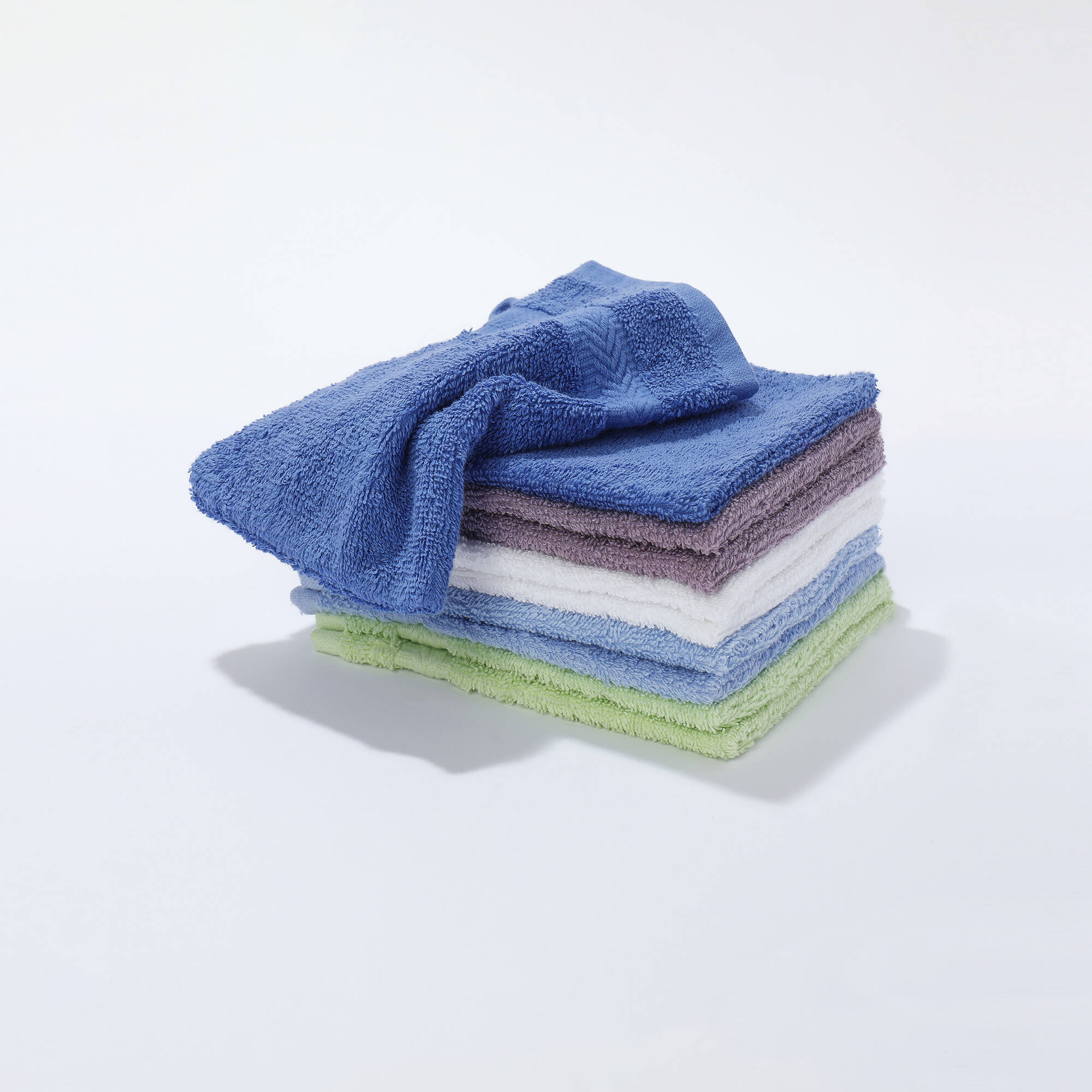 Gants de toilette coloris assortis - lots