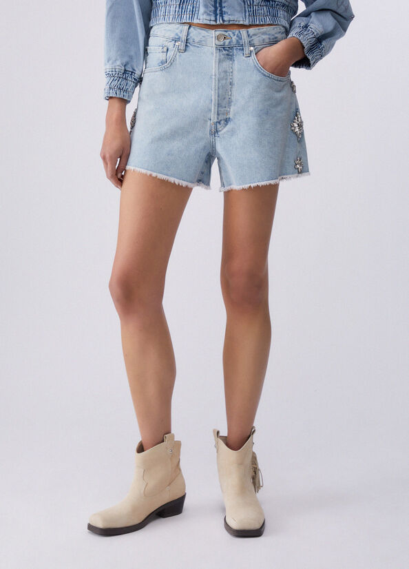 Short in denim con ricami gioiello
