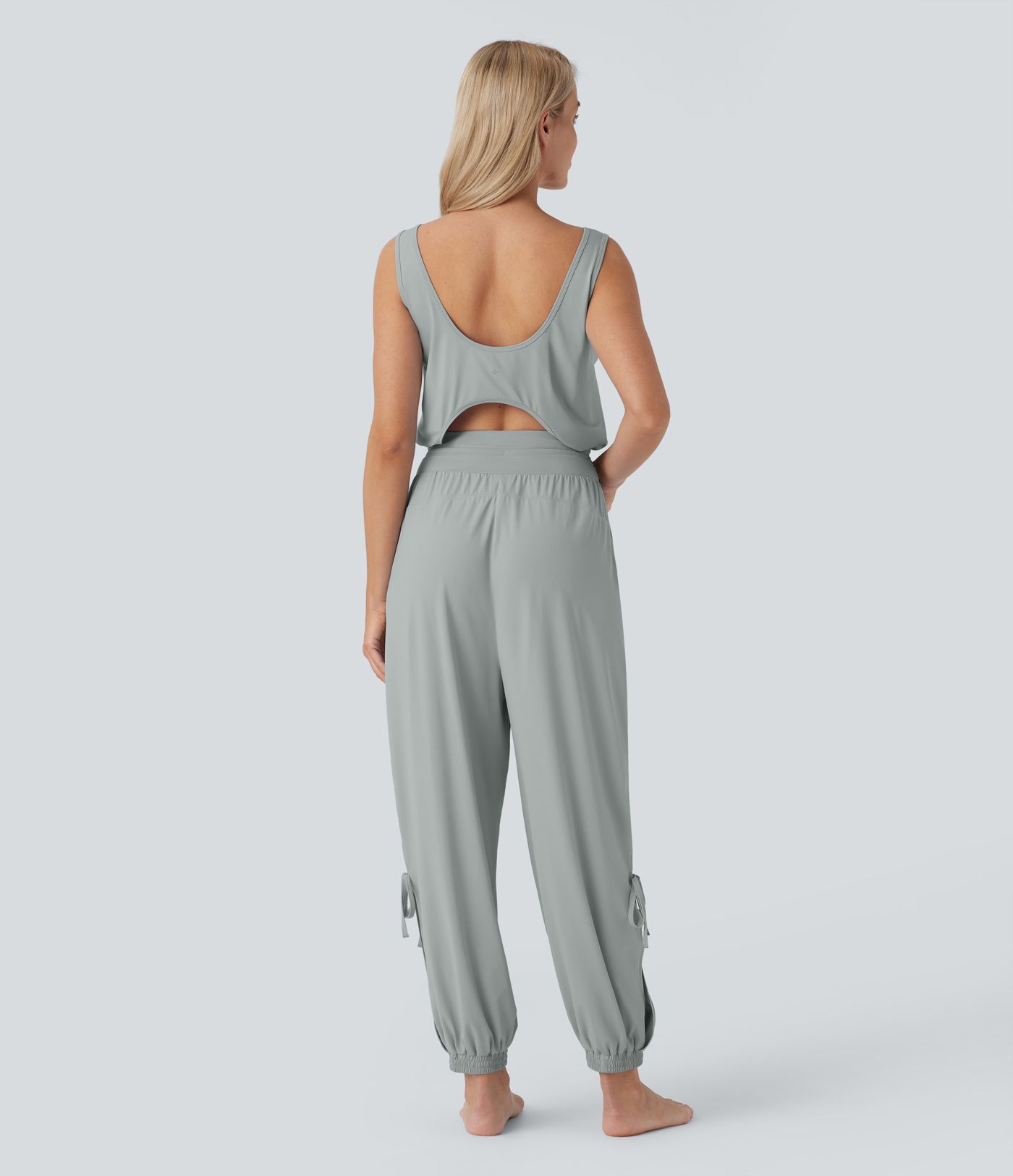 Combinaison de yoga col bateau sans manches dos nu avec découpes et poches latérales à cordon de serrage effet frais InstantCool, protection solaire UPF50