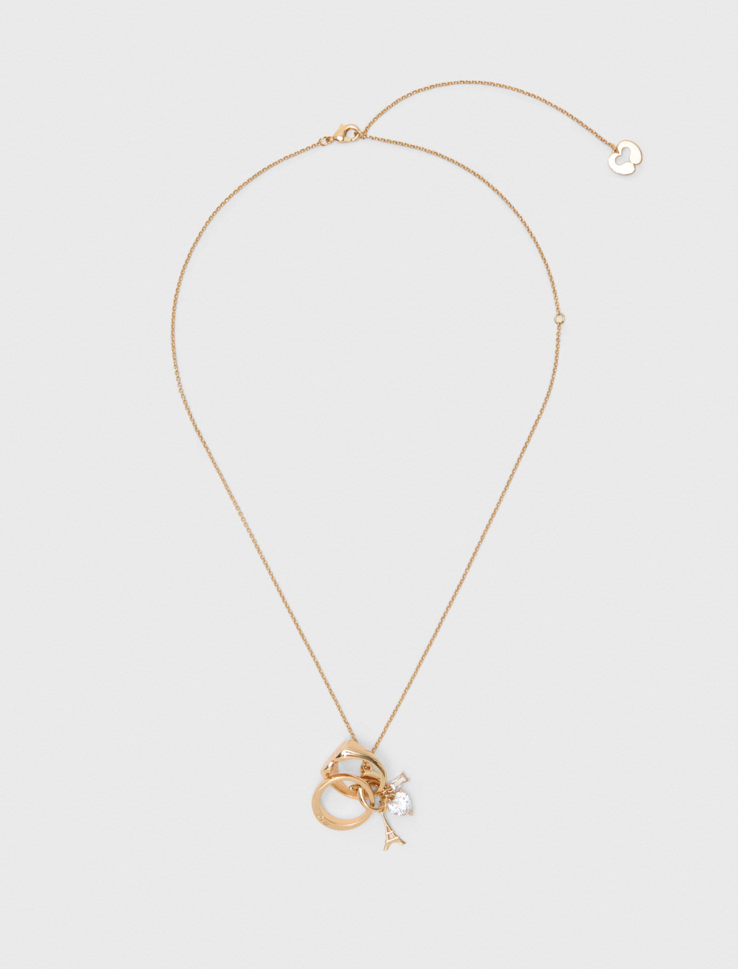 Collier doré avec détails bagues