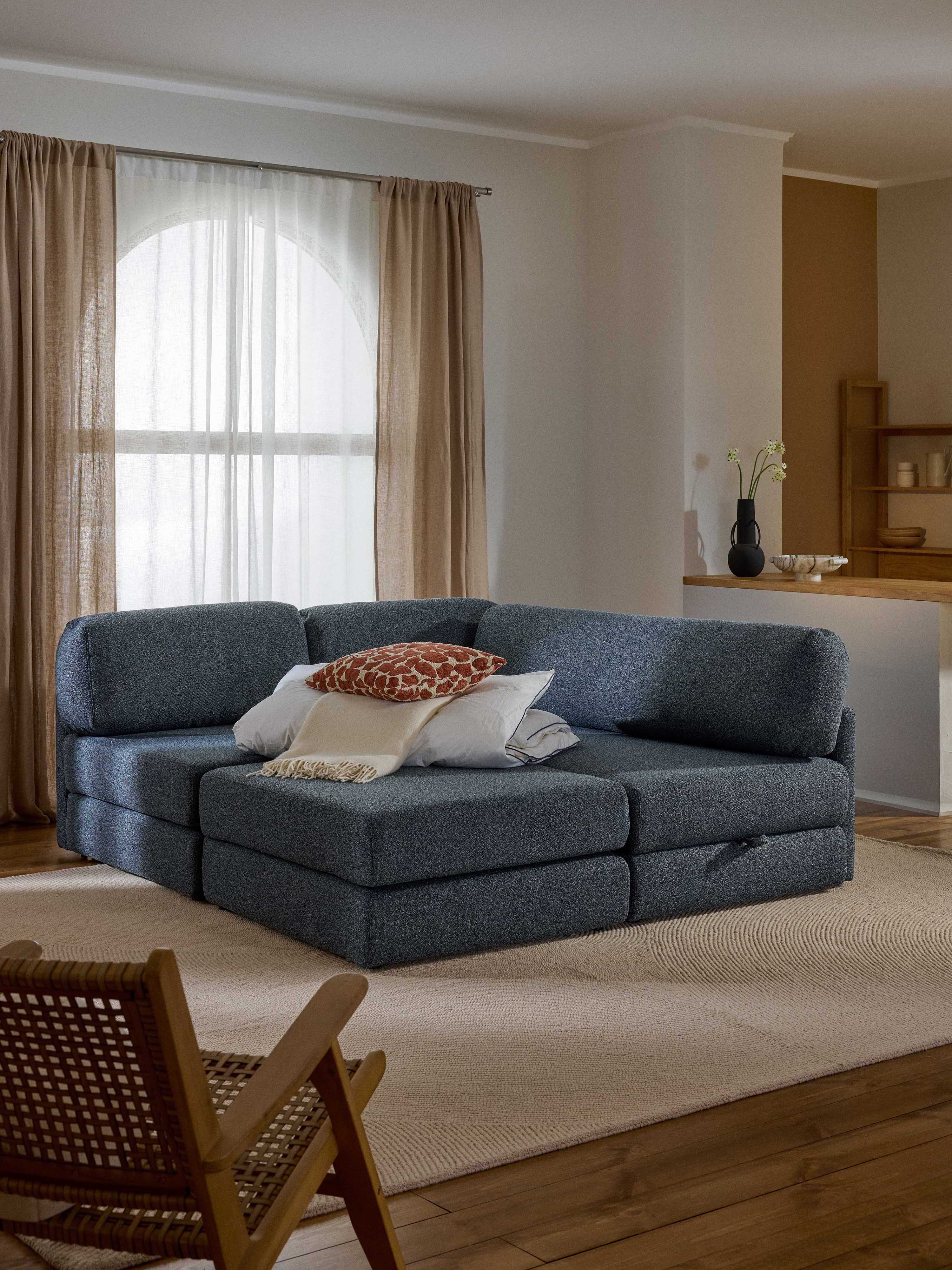 Bouclé-Eck-Schlafsofa Ladina mit Stauraum
