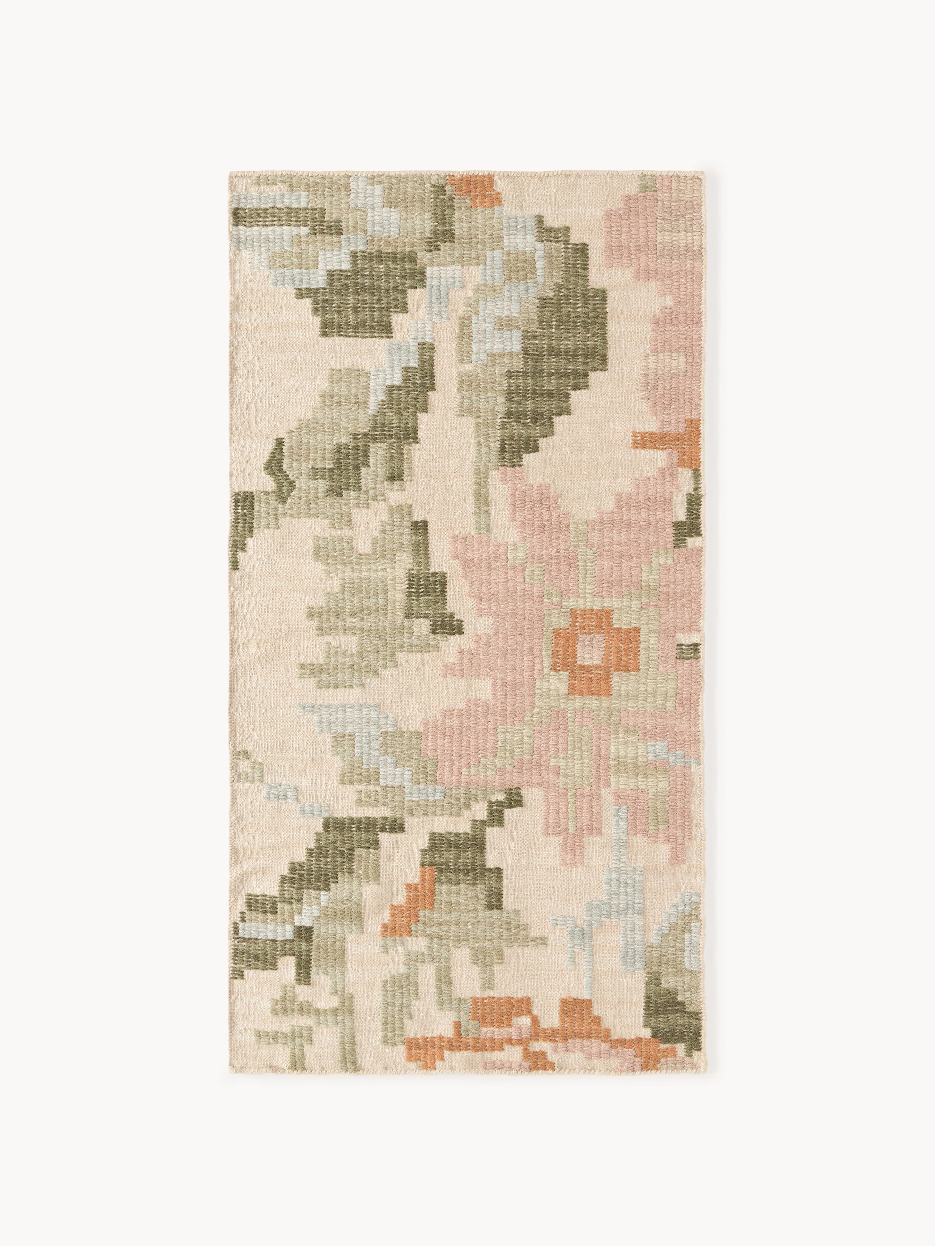 Wollteppich Rosha mit gesticktem Blumenmuster
