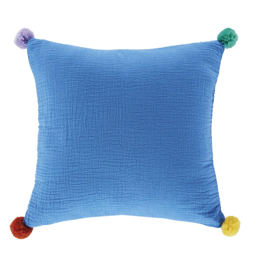 - Coussin à pompons et imprimé 