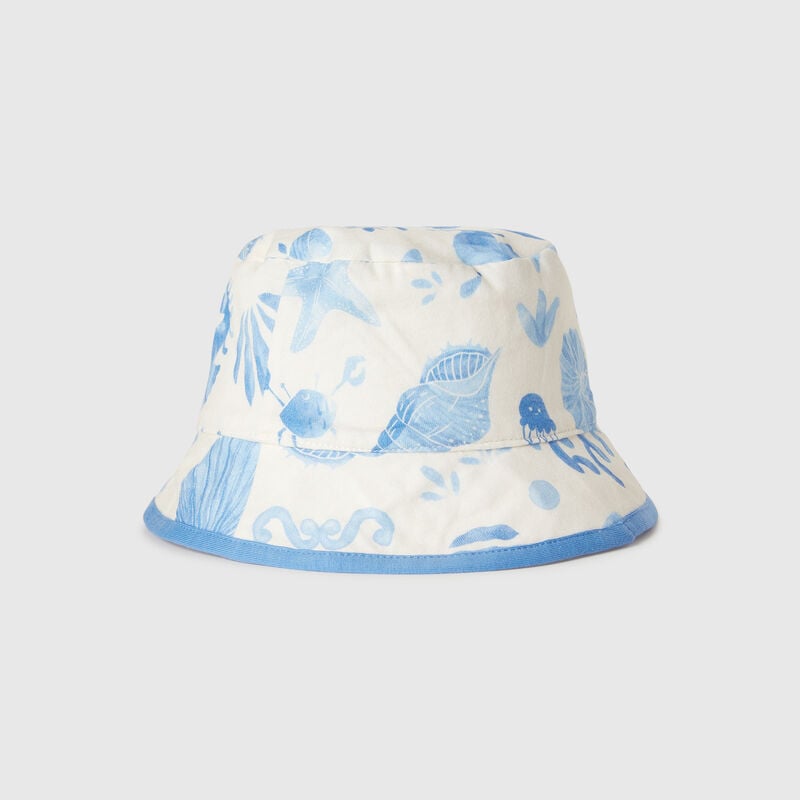 Reversible hat with beach print