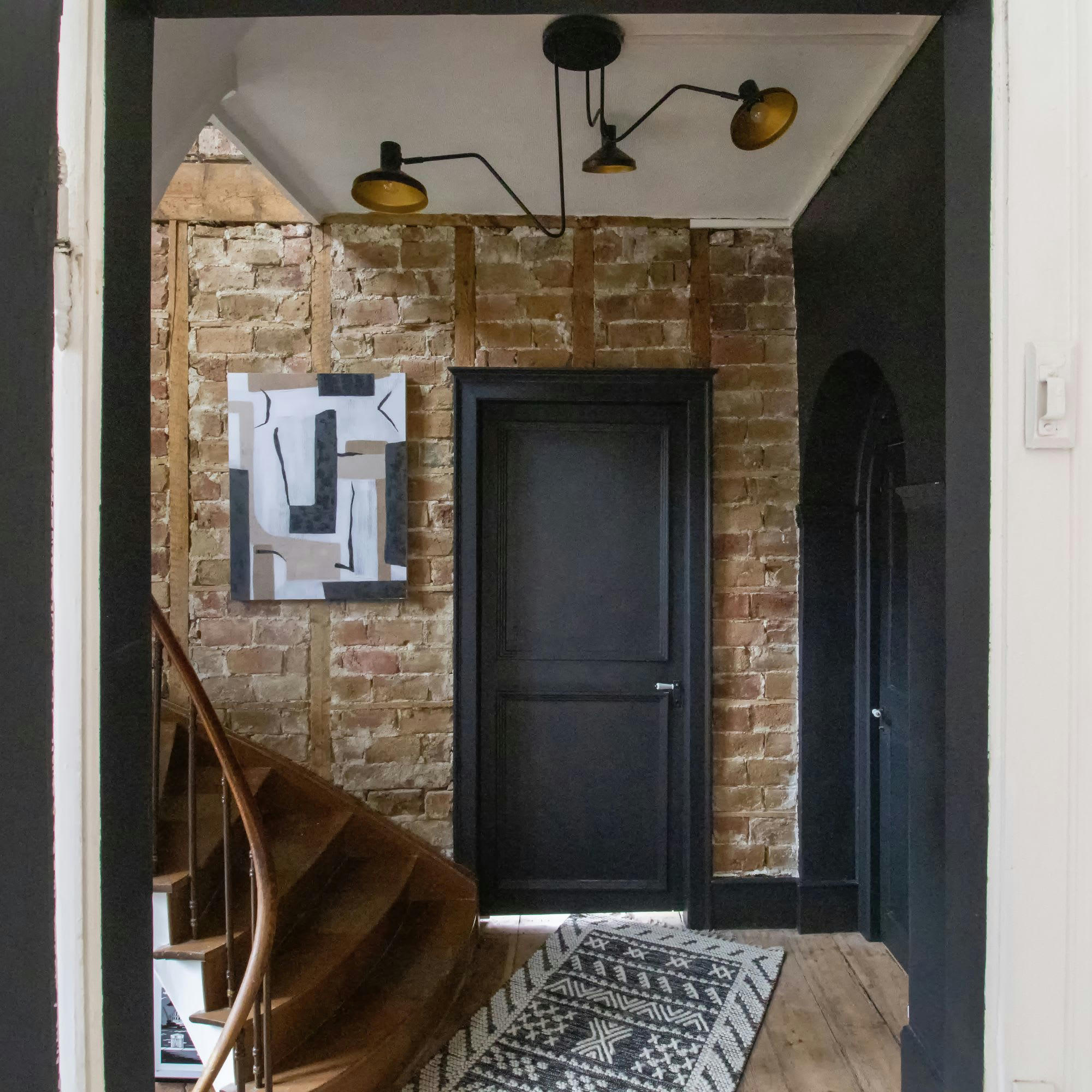 SNAKE - Suspension triple en métal noir et doré h51cm