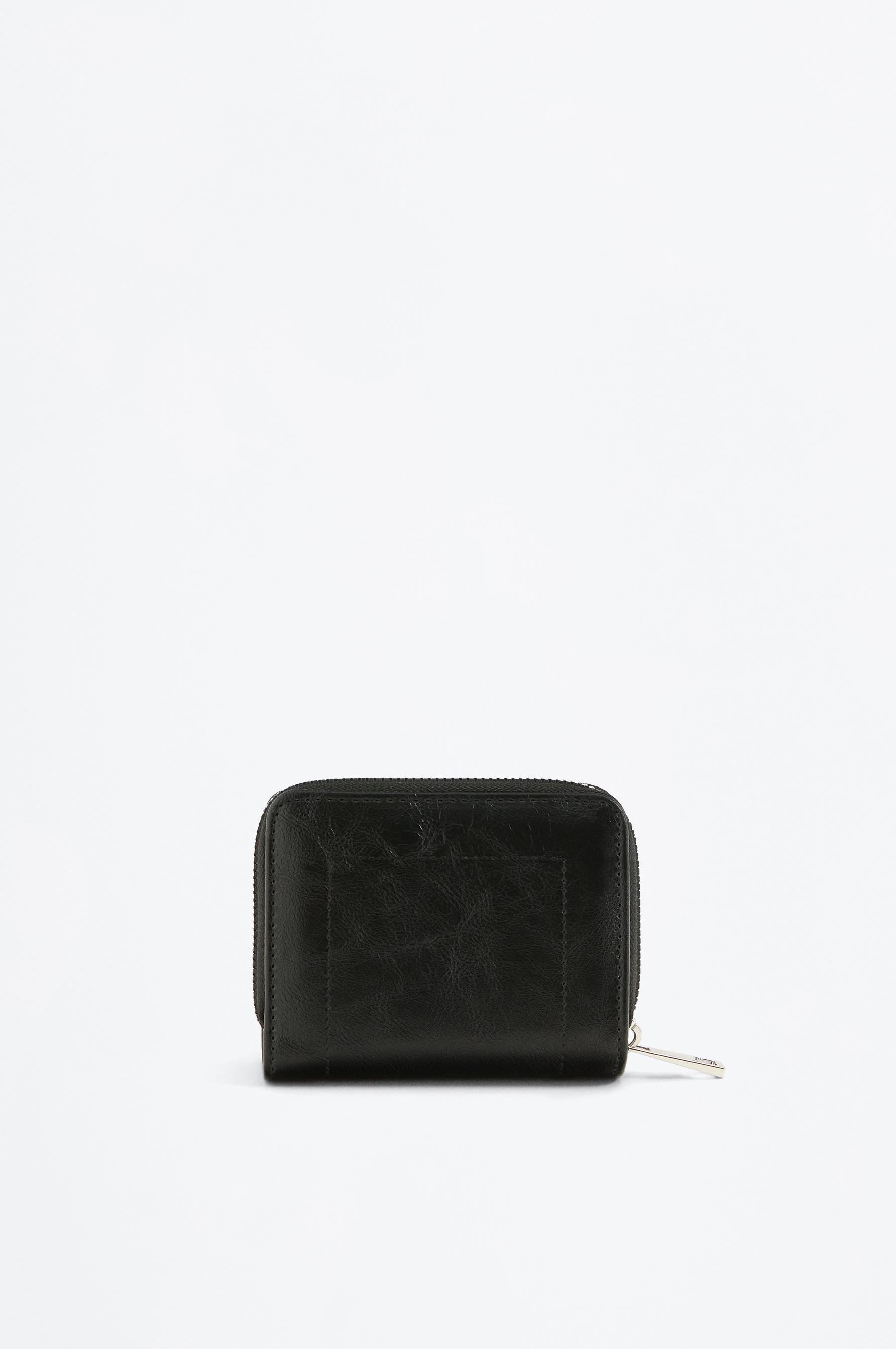 Cartera tachas