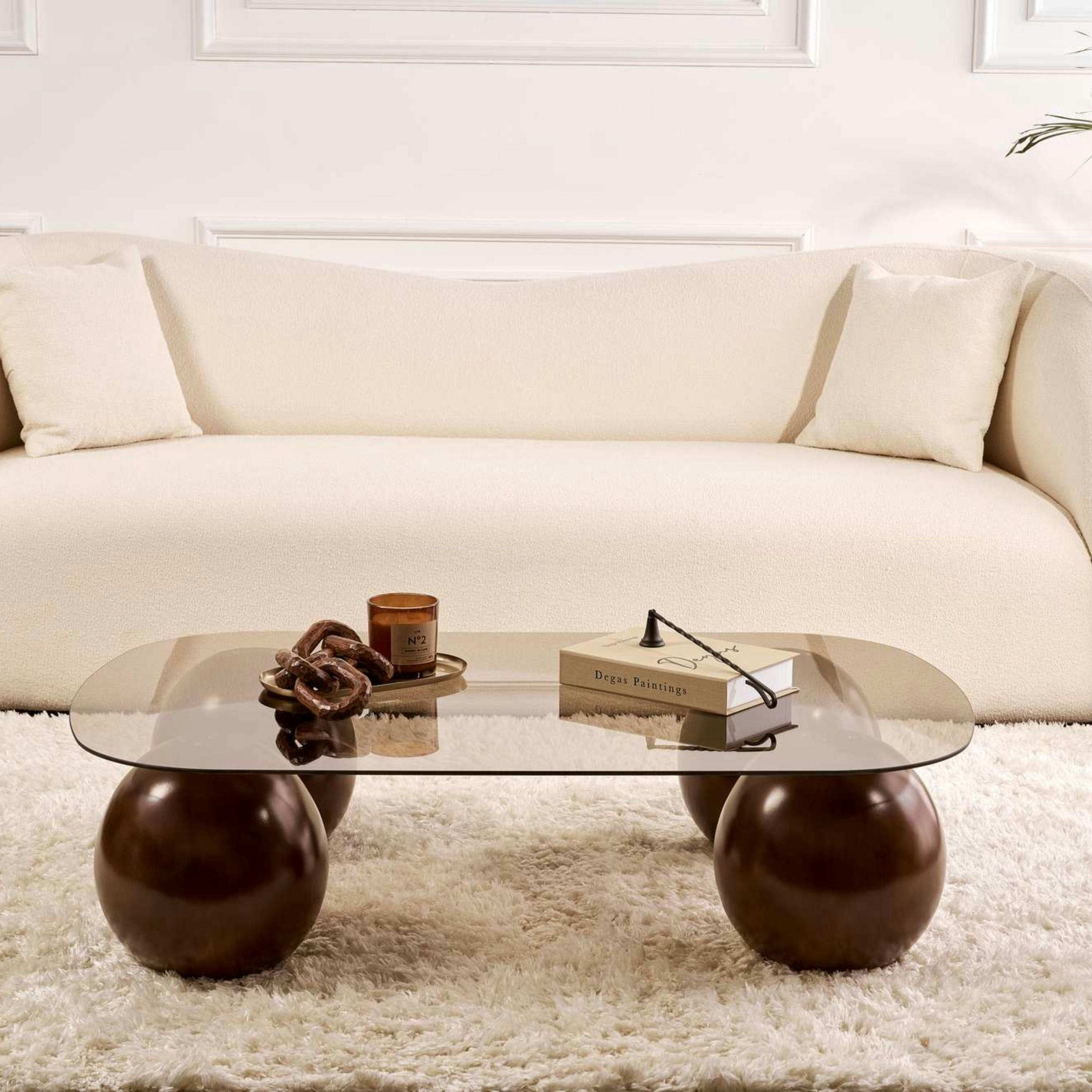Table basse verre ambré bords arrondis 4 pieds boule KOCHI