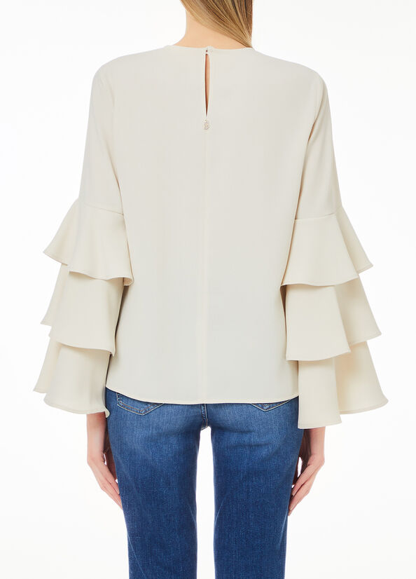 Blusa in cr&ecirc;pe stretch