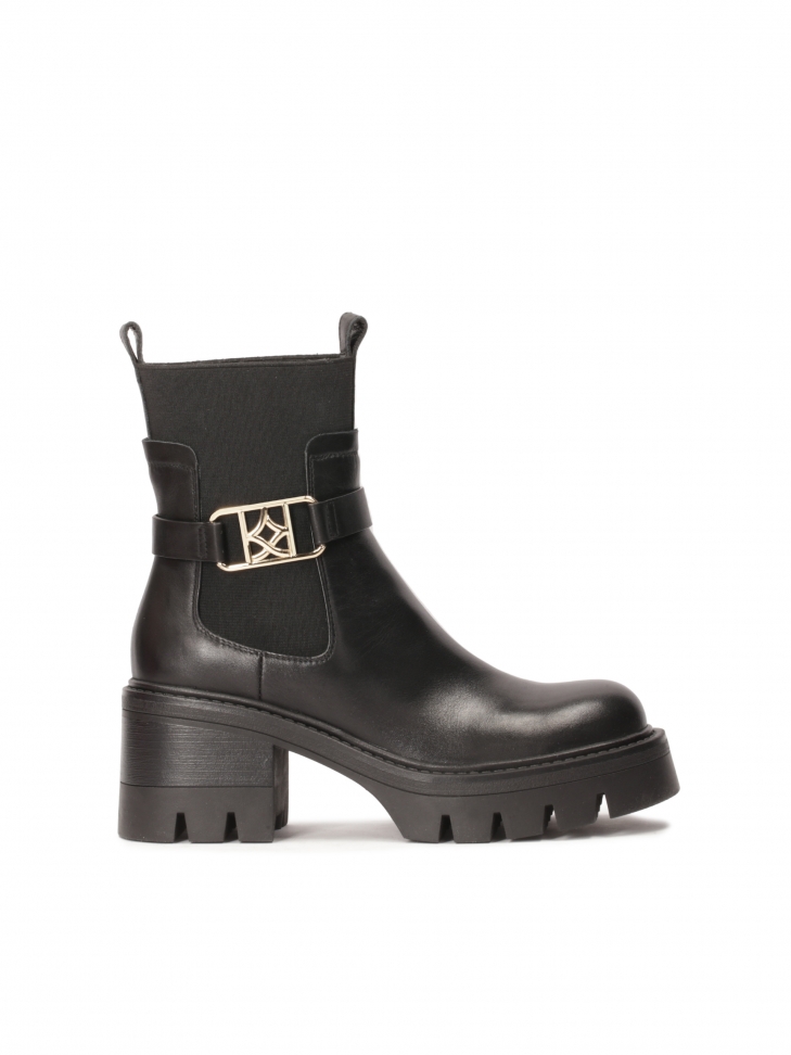 Slip-on boots with decorative detachable strap