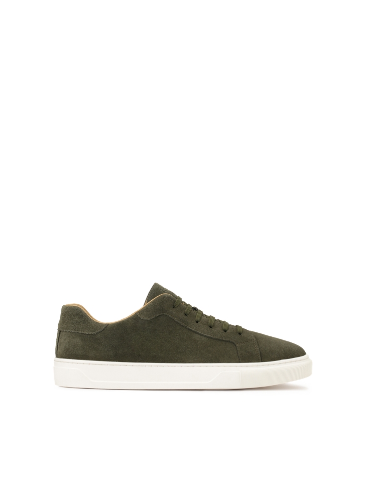 Khaki suede sneakers on a white sole