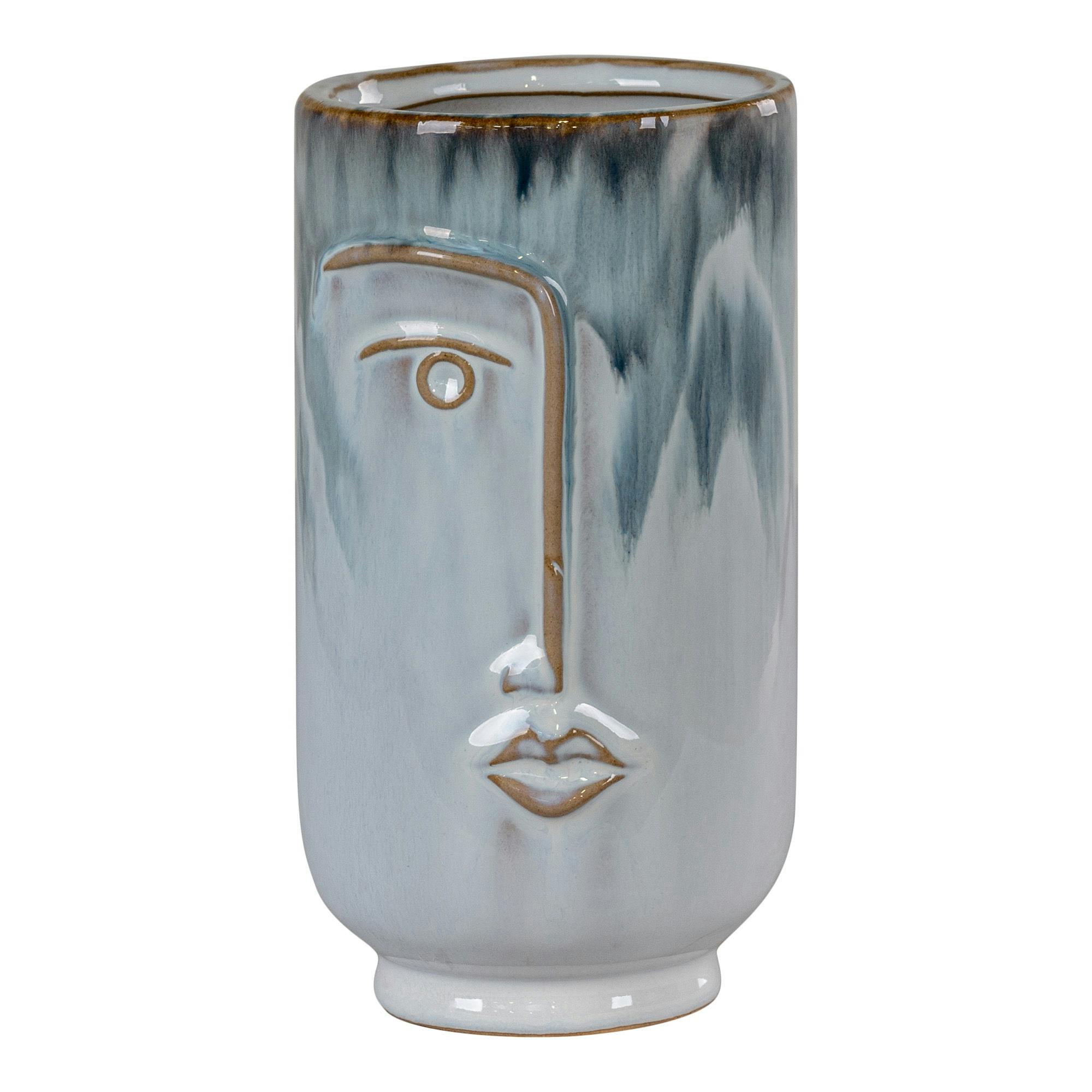 Vase moderne bleu avec motif visage