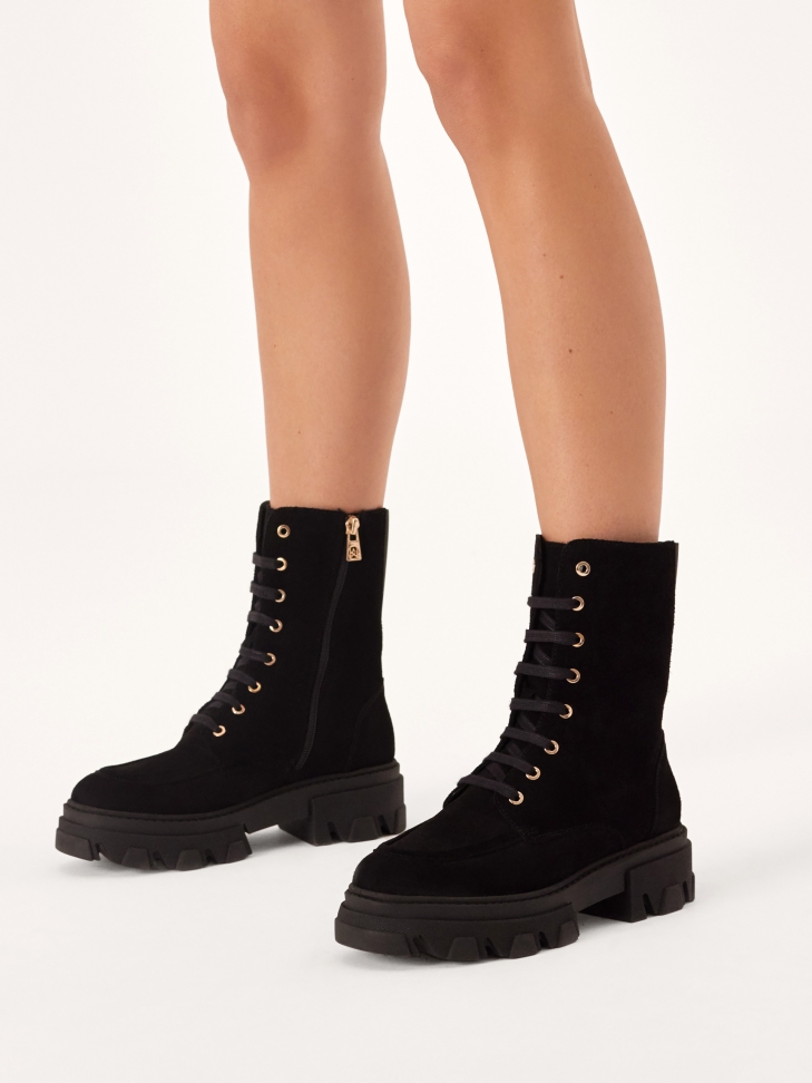 Black suede boots in military style