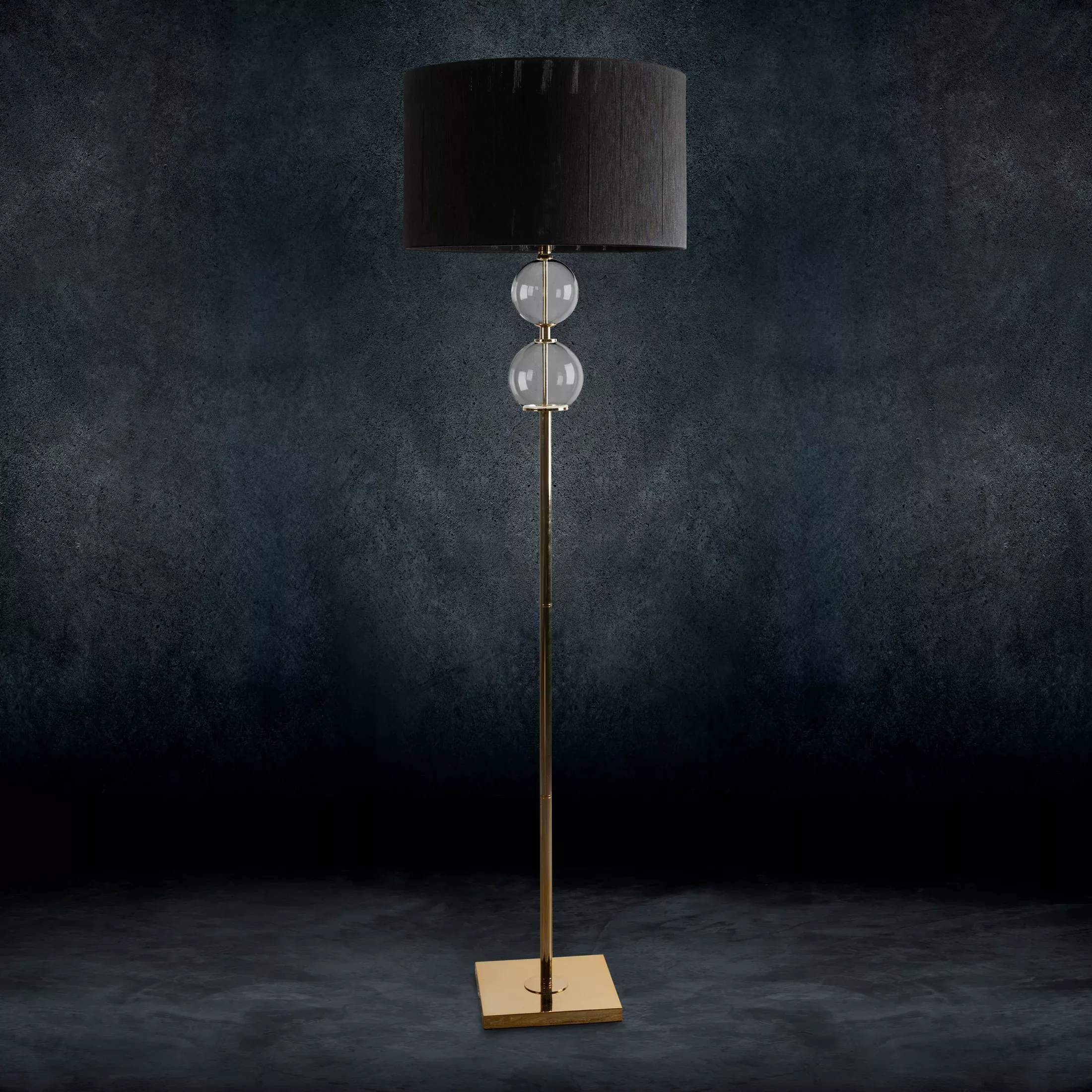 Lampa stojąca do pokoju czarno, złota ARIANA na podstawie łączącej szkło metal i abażur z matowej nici