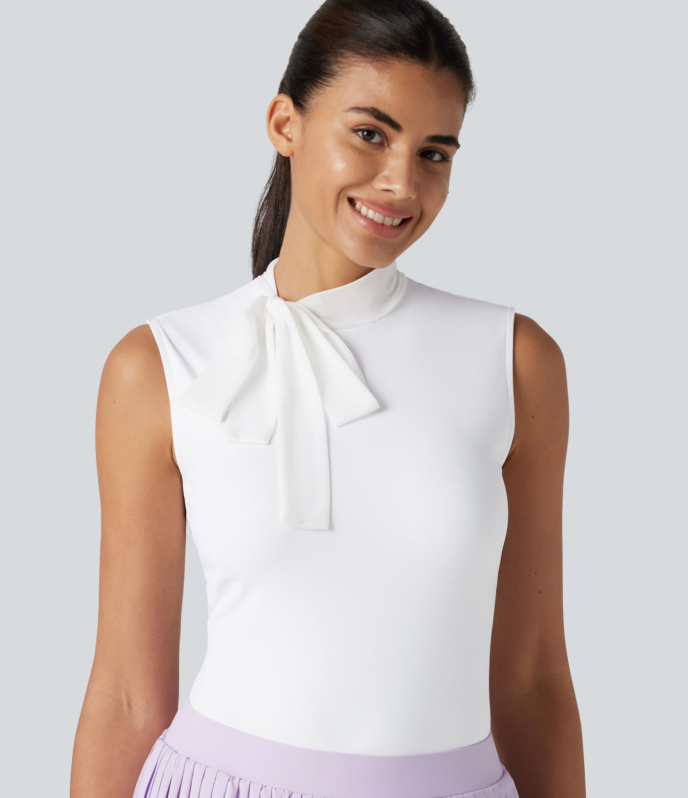 Haut de sport golf SoftlyZero™ Airy sans manches col cheminée avec nœud effet frais InstantCool, protection solaire UPF50