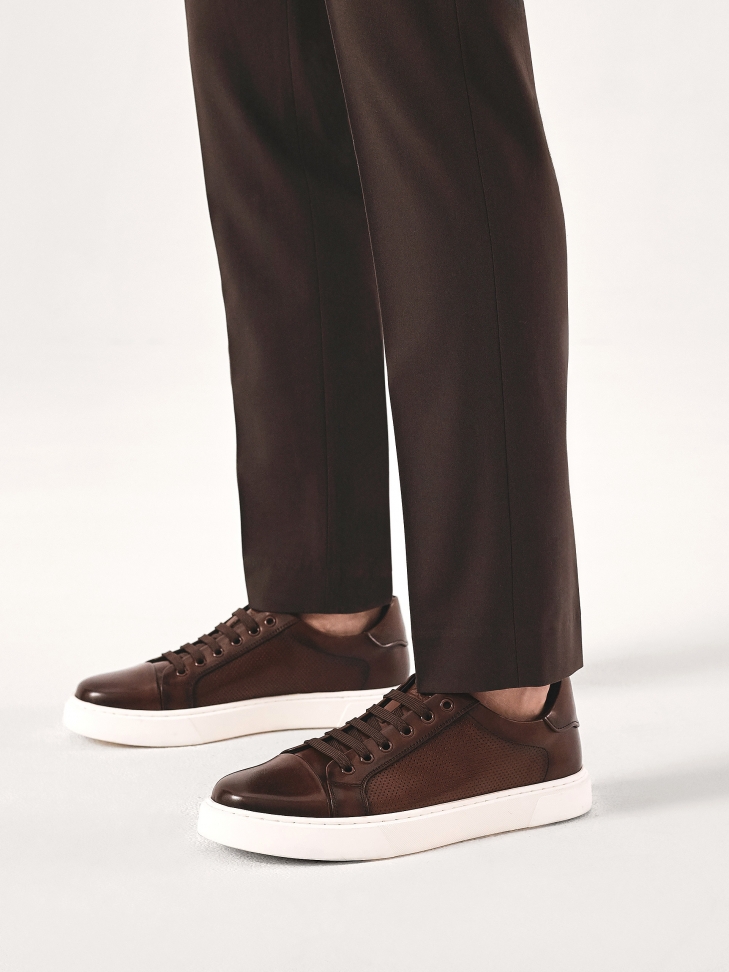Brown casual sneakers with perforations