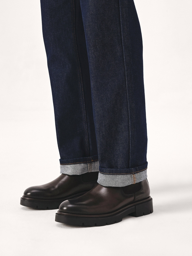 Brown Chelsea boots with a thick sole