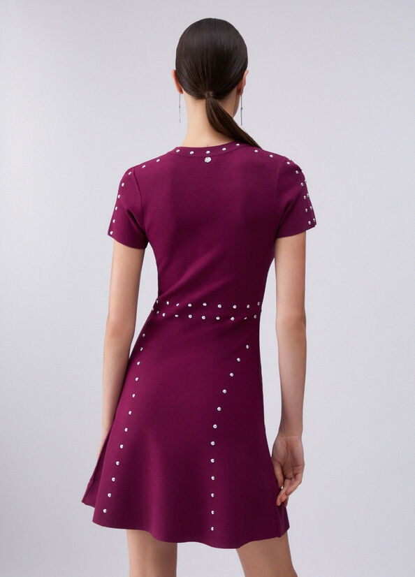 Abito in maglia con borchie